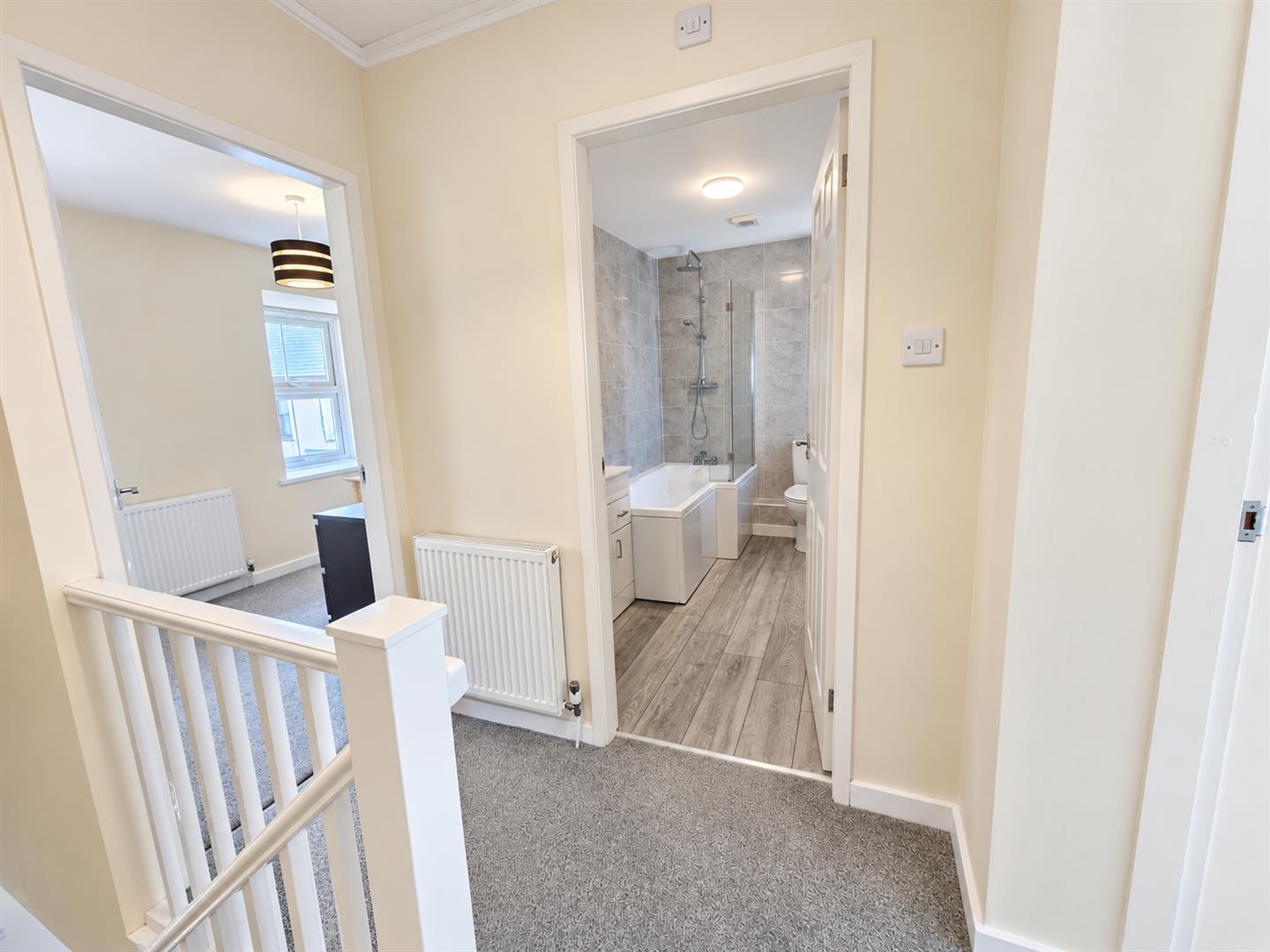 Bright Neutral Hallway with Open Rooms (1).png